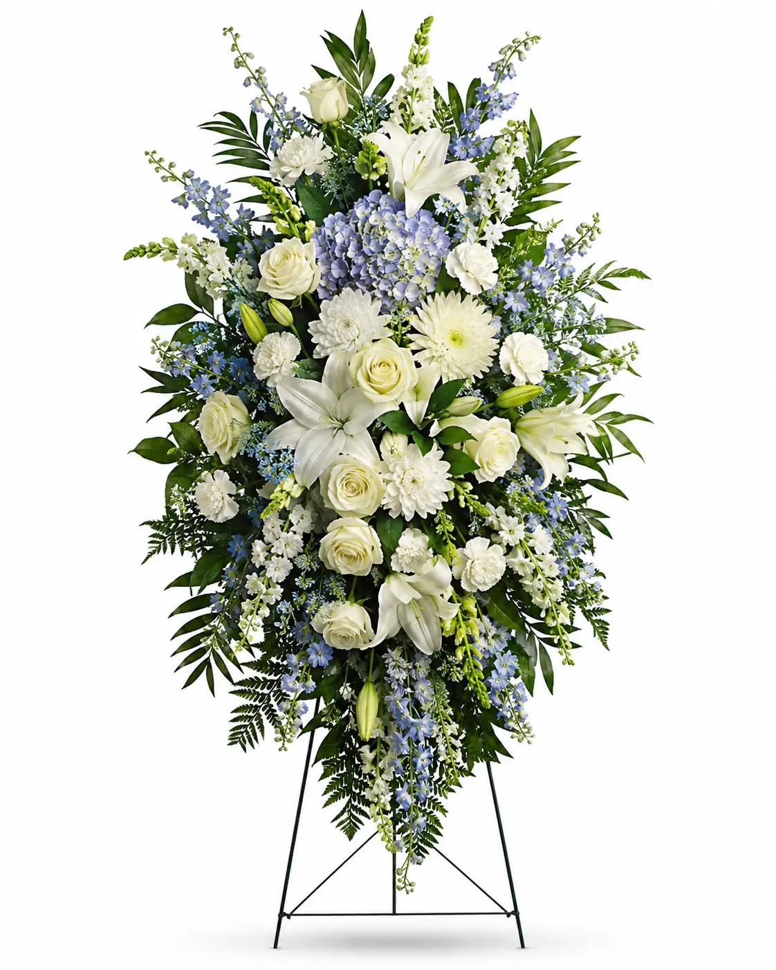 Large white floral bouquet with lilies, roses, orchids, hydrangeas, and greenery.